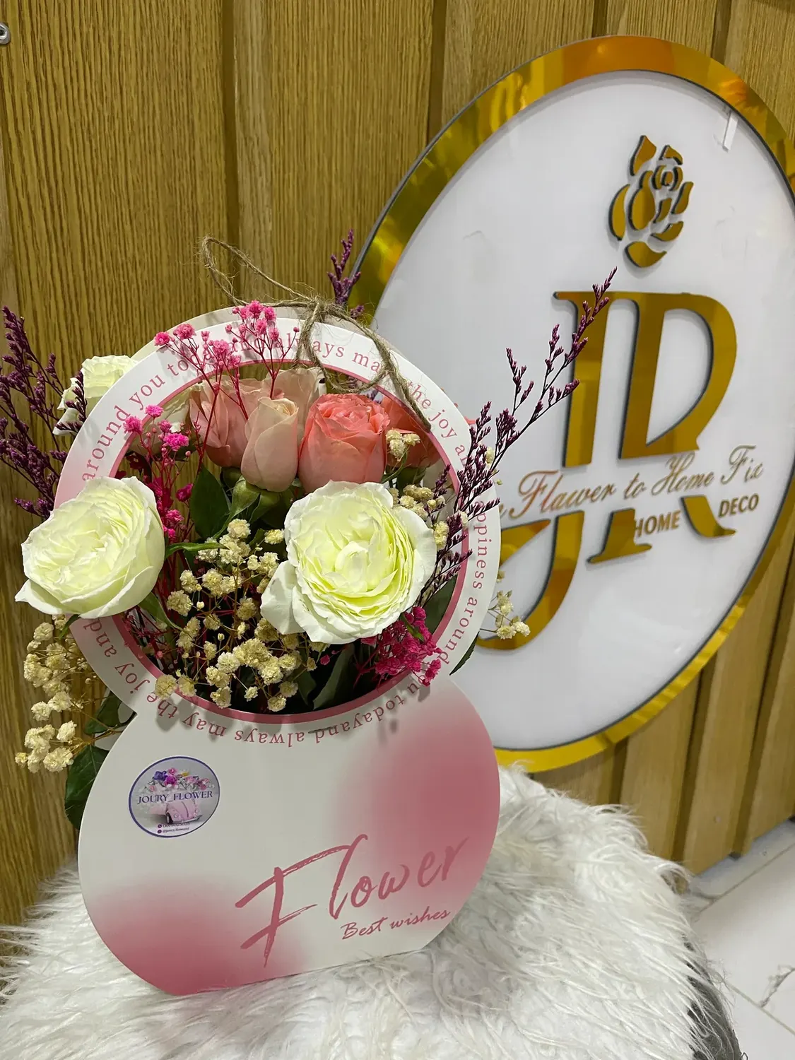 Flower pocket bouquet with soft pink and ivory roses by Joury Flowers