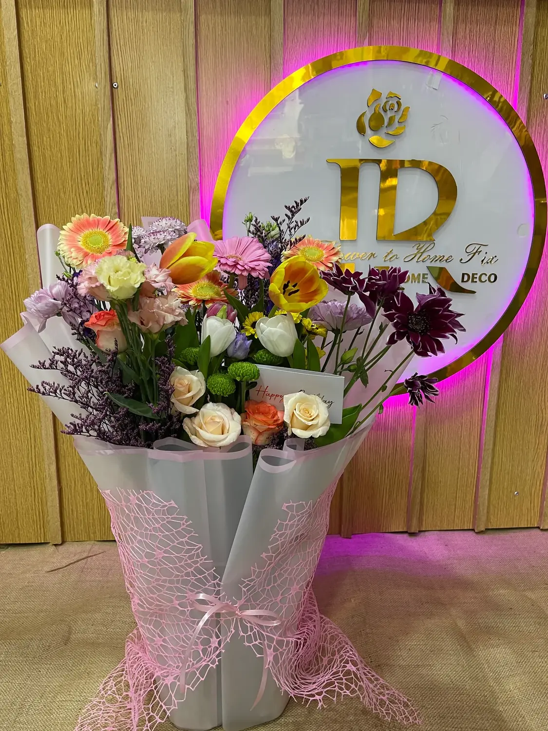 Pastel anniversary flower basket by Joury Flowers