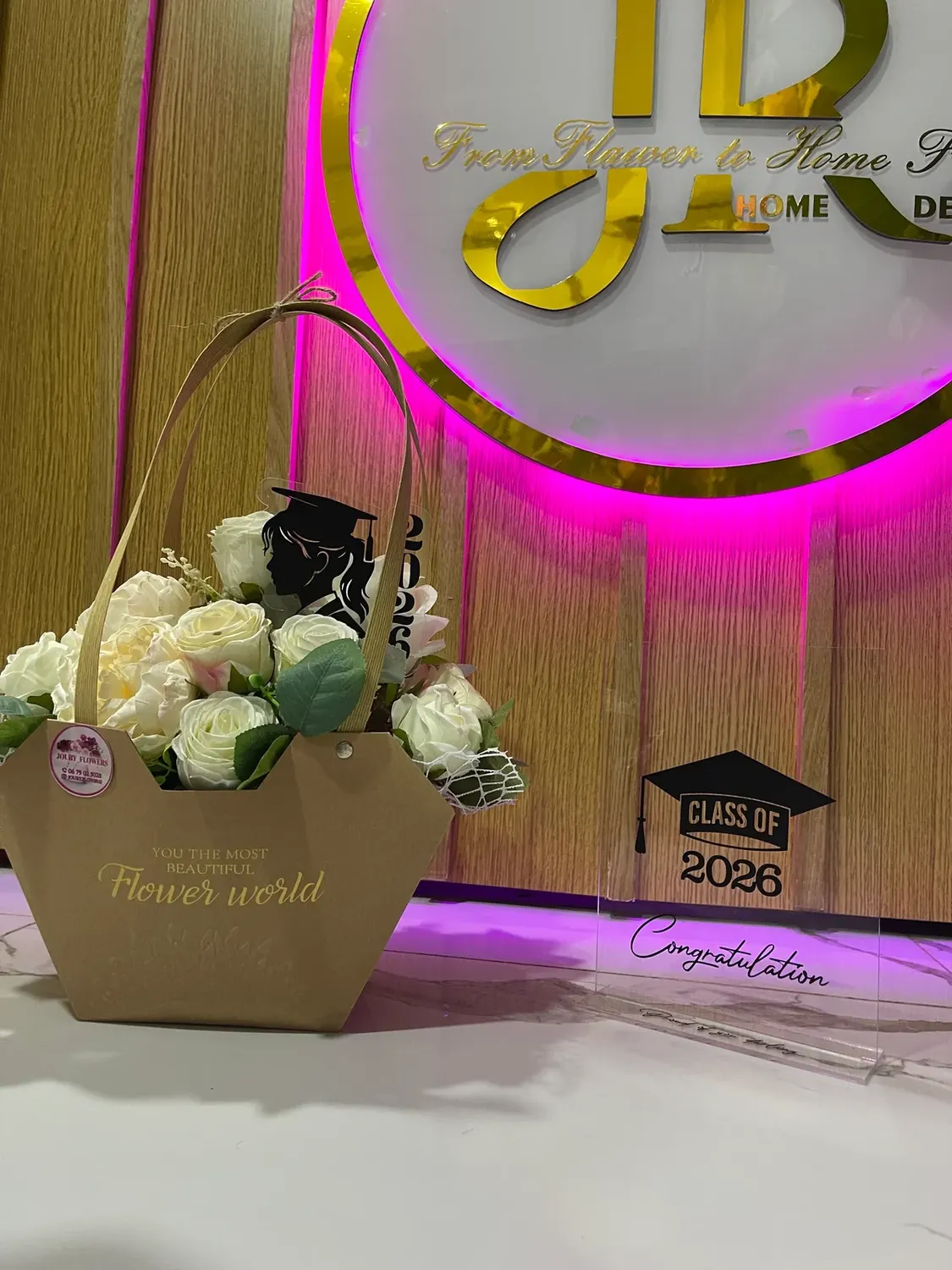 Graduation flower bucket gift by Joury Flowers