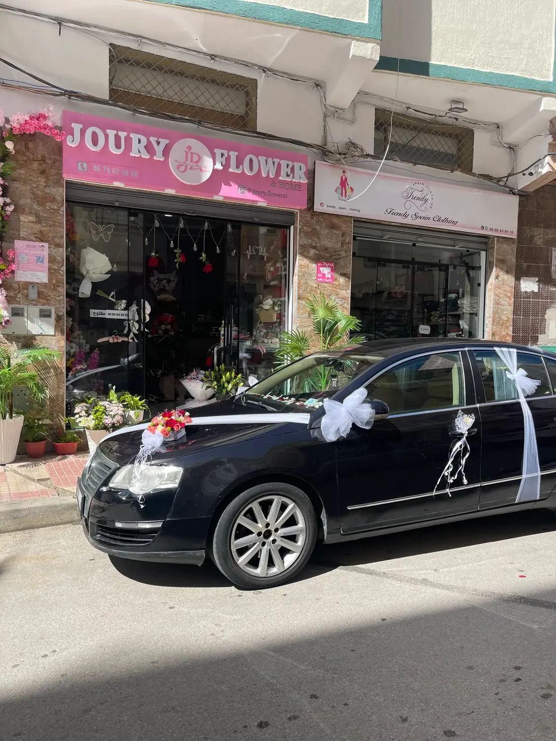 White Ribbon Sedan car decoration by Joury Flowers