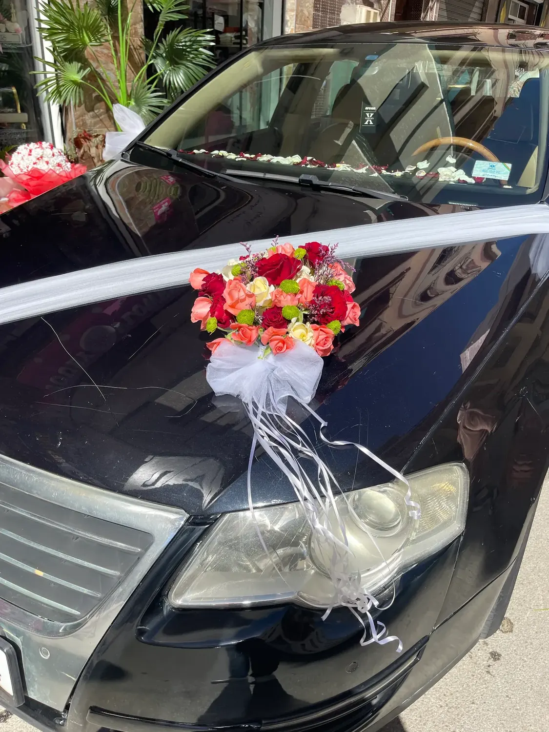 Hood flower accent by Joury Flowers